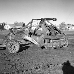 Cover image for Photograph - Glenorchy State School, scoop, earthmoving equipment
