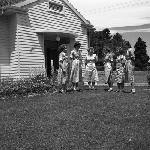 Cover image for Photograph - G.V. Brooks Community School, students outside classrooms