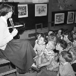 Cover image for Photograph - New Norfolk Pre-School, teacher reading to children