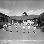 Cover image for Photograph - Kingston School, students in a circle