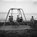 Cover image for Photograph - Children with swings and an ice-cream cone