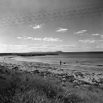 Cover image for Photograph - "The Nut", Stanley, man on the beach, taken from Smithton Road