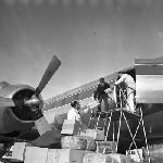 Cover image for Photograph - Cambridge Airport, loading parcels on Convair