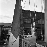 Cover image for Photograph - Hobart Wharves, Hauling flag at Harbour Master's house