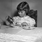 Cover image for Photograph - Pouring milk from a jug, for pottery film strip