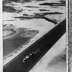 Cover image for Photograph - Suez Canal, aerial view of ship passing through Suez Canal (copy)