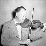 Cover image for Photograph - Man playing violin