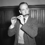 Cover image for Photograph - Man playing musical instrument