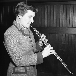 Cover image for Photograph - Woman playing musical instrument