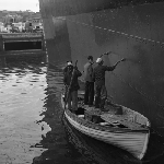 Cover image for Photograph - Hobart Port, workers painting hull of ship