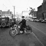Cover image for Photograph - Liverpool Street, Hobart, Policeman on a BSA motorcycle