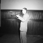 Cover image for Photograph - Man playing Trumpet