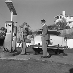 Cover image for Photograph - Hobart, filling car with petrol