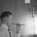 Cover image for Photograph - Boy playing pipe
