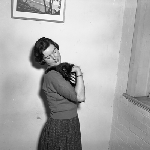 Cover image for Photograph - Mother holding the kitten
