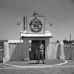 Cover image for Photograph - Brighton National Service Army training camp, soldier on guard duty at entrance