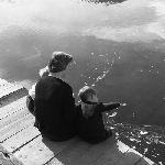 Cover image for Photograph - Children and mother watching leaves float by