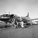 Cover image for Photograph - Llanherne (now Hobart) Airport, passengers disembarking Ansett Airways