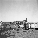 Cover image for Photograph - Llanherne (now Hobart) Airport, passengers walking to waiting room from Ansett Airways plane