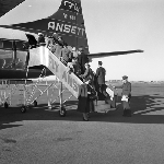 Cover image for Photograph - Llanherne (now Hobart) Airport, passengers boarding Ansett Airways