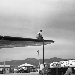 Cover image for Photograph - Llanherne (now Hobart) Airport, fuelling Australian National Airlines (A.N.A) plane