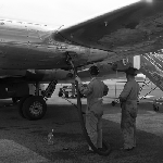 Cover image for Photograph - Llanherne (now Hobart) Airport, fuelling Trans-Australian Airlines (T.A.A) plane