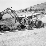 Cover image for Photograph - Tractor trencher (back hoe)