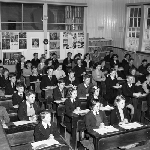 Cover image for Photograph - South Queenstown State School, classroom with students - 2 photographs