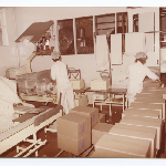 Cover image for Photograph - Lactos Pty Ltd - Factory interior - packing station