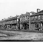 Cover image for Photograph - Early view of Georgian shops in Brisbane Street Launceston. Includes Overell, McMillan & Hopkins, Criterion House, Dowie & Woodgate & Bennett.