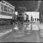 Cover image for Photograph - Hobart - Hobart Municipal Tramways - interior of tram sheds after floods / Photographer James Chandler