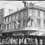Cover image for Photograph - Hobart - Elizabeth Street - at Liverpool Street intersection shows Charles Davis store and Goldings corner / Photographer James Chandler