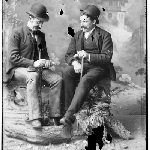 Cover image for Photograph - studio portrait of two men in bowler hats [one man smoking cigarette] [glass plate]