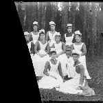 Cover image for Photograph - Group of women in uniform [may be nurses, domestic help, students etc] [part view as glass plate broken)