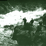 Cover image for Lantern slide - Launceston - Cataract Gorge - in flood - photographer taking photographs from the rocks