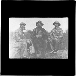 Cover image for Photograph - glass lantern slide - three unidentified men wearing rainwear