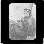 Cover image for Photograph - glass lantern slide - unidentified woman smoking a pipe