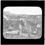 Cover image for Photograph - glass lantern slide - Port Arthur - view from behind church towards penitentiary - J.W. Beattie, Hobart, Tasmanian Series No. 152B