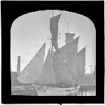 Cover image for Photograph - glass lantern slide - yachts - 'Heather Belle' drying sails - photo by Nat Oldham