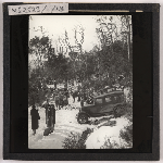 Cover image for Photograph - Vehicles and people in snow conditions - skiers - Cradle Mountain or Ben Lomond (?) / Fred Smithies [lantern slide]