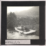 Cover image for Photograph - Gustav Weindorfer and Frederick Smithies in punt at lakeside (Dove Lake) / Fred Smithies [lantern slide]