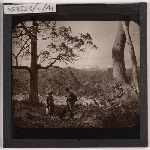 Cover image for Photograph - "along the track about a mile from Pencil Pine Creek - Gustav Weindorfer and a lady" (pencil description) / Fred Smithies [lantern slide]