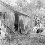 Cover image for Photograph - Calder Pass - Southern end of the Loddon Plains - Halfway Hut, track to Jane River Gold Diggings - Norm Hutton and Terry Woodward in foreground.