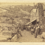 Cover image for Photograph - Mount Lyell No 4 Tunnel, showing miners