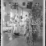 Cover image for Photograph - Glass negative - Celebration - hospital [two nurses In ward]