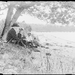 Cover image for Photograph - Glass negative - Riverbank [picnic group, jetty in background]