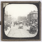 Cover image for Photograph - Glass slide - Intersection [city street scene] [horses and carts, men in top hats]
