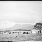 Cover image for Photograph - Glass negative - [Parish picnic on Eastern shore - Mt Wellington in background]