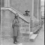 Cover image for Photograph - Negative - Two men in uniform outside church