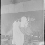 Cover image for Photograph - Negative - Chores [man in apron holding a ladle]